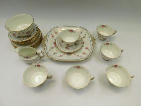 A Royal Crown Derby six piece tea set with cream and sugar bowl. crack to cream jug