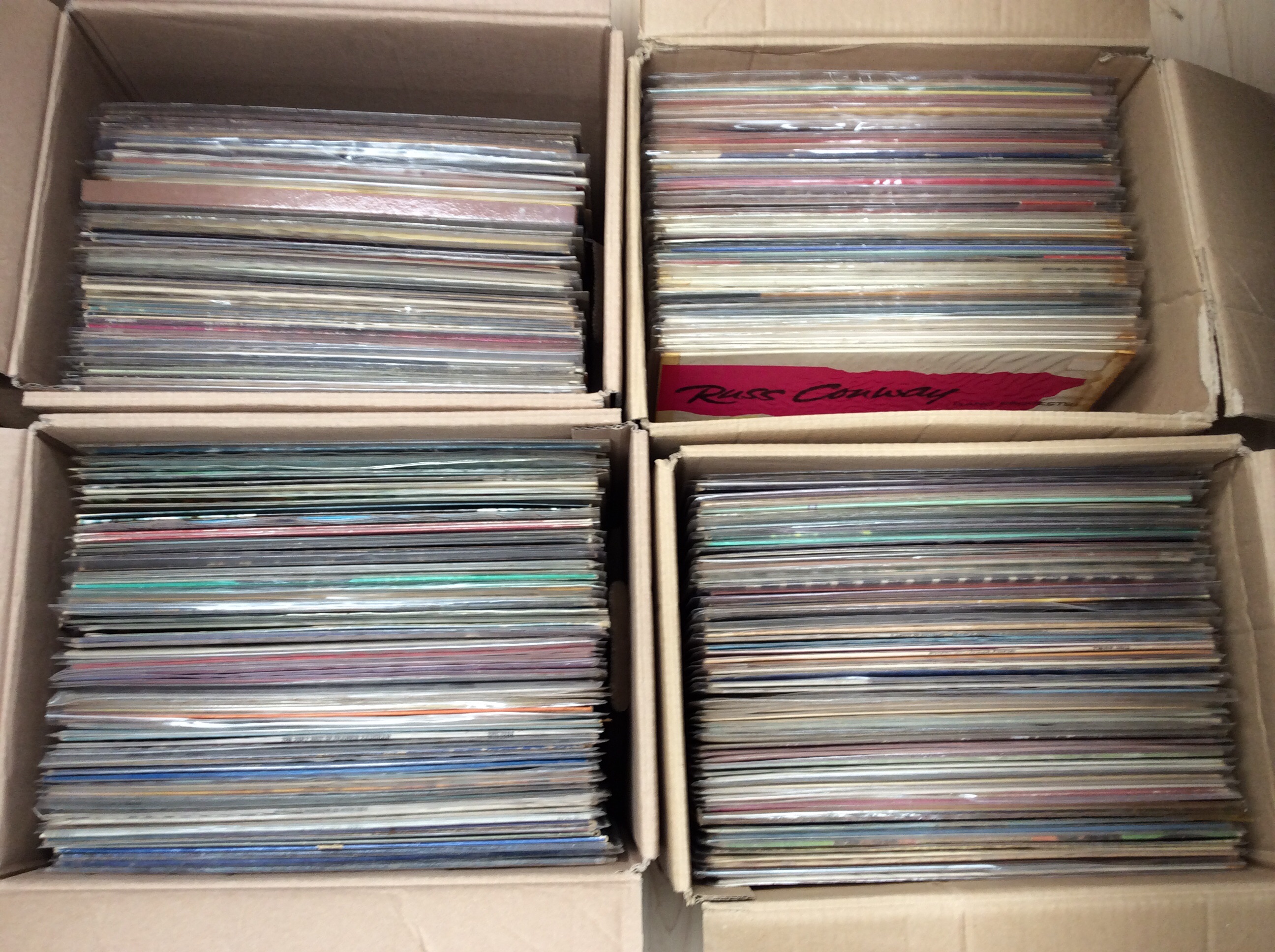 Four boxes of LPs to include Frankie Vaughn, 3 Degrees, Kenny Rogers, Russ Conway etc. Approx 200