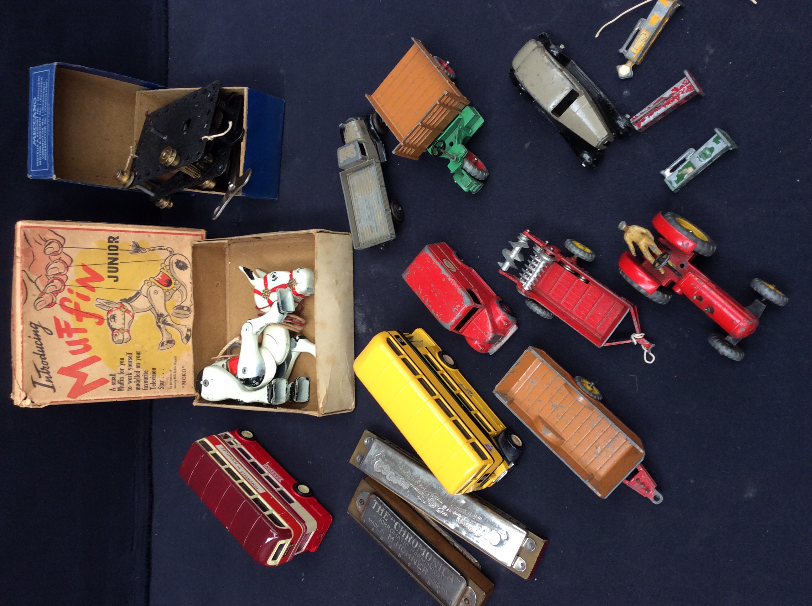 Collection of toys, harmonicas x2, Meccano, Muffin the Mule in box.