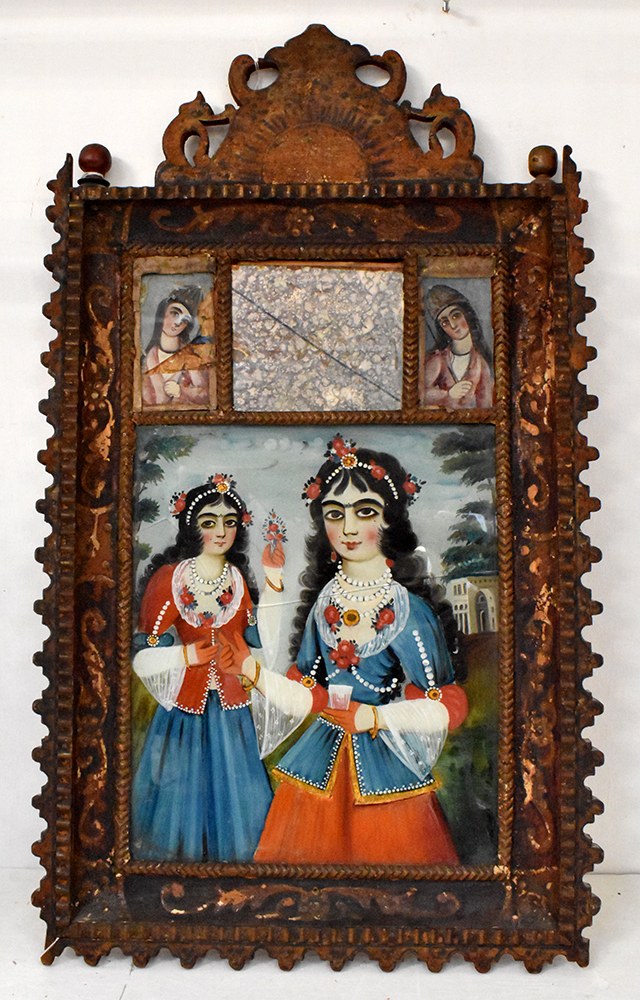 A pair of 19th century Indo-Persian reverse glass paintings, each a pair of young women of the Qajar