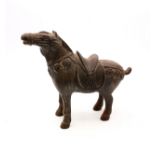 A 20th century Tang style cast metal horse figure.