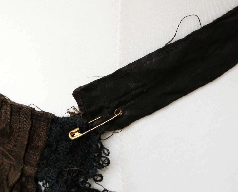 A black silk mowry shawl, early 1900s, embroidered corner and silk tassels (some holes), a black - Image 3 of 4