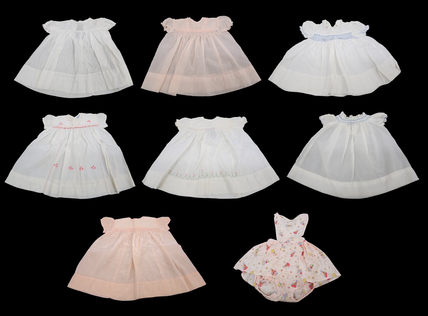 Baby dresses dating from the late 1940s/50s/60s, to include: smocked baby dresses in white and pale