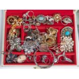 A collection of costume jewellery to include various silver and white metal stone set rings,