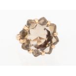 A vintage smoky quartz 9ct gold dress ring, comprising a fancy cut stone claw set, diameter approx