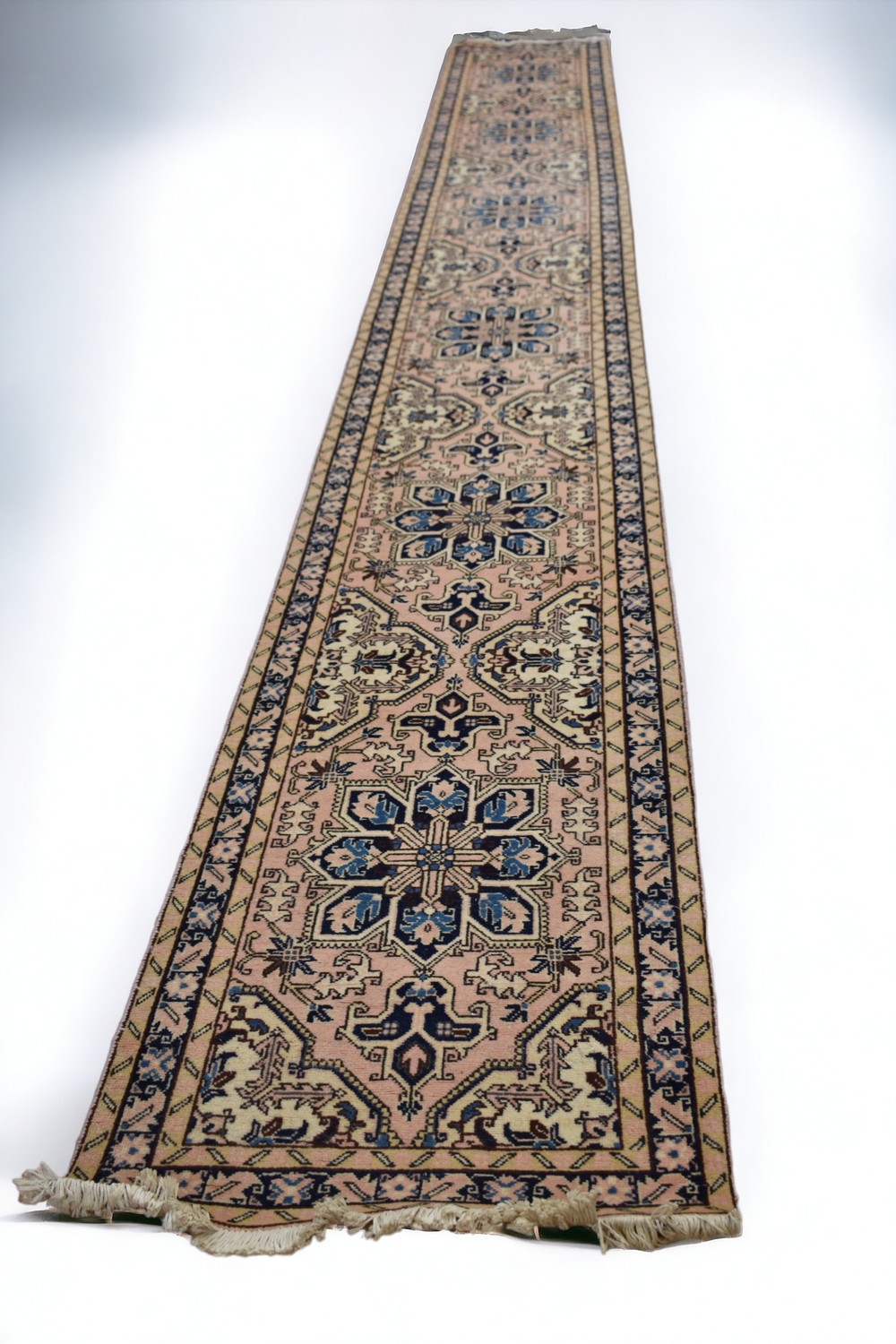 Two 20th century machine made Eastern style rugs - one a carpet square, other a runner. (2)