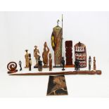 A collection of carved African and other continental treen figures.