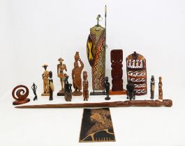 A collection of carved African and other continental treen figures.