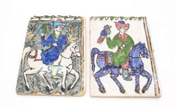 A pair of 19th Century wall tiles with Persian figures on horse back.