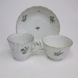 A Flight and Barr Worcester trio, coffee cup, tea bowl and saucer spiral fluted, incised B and