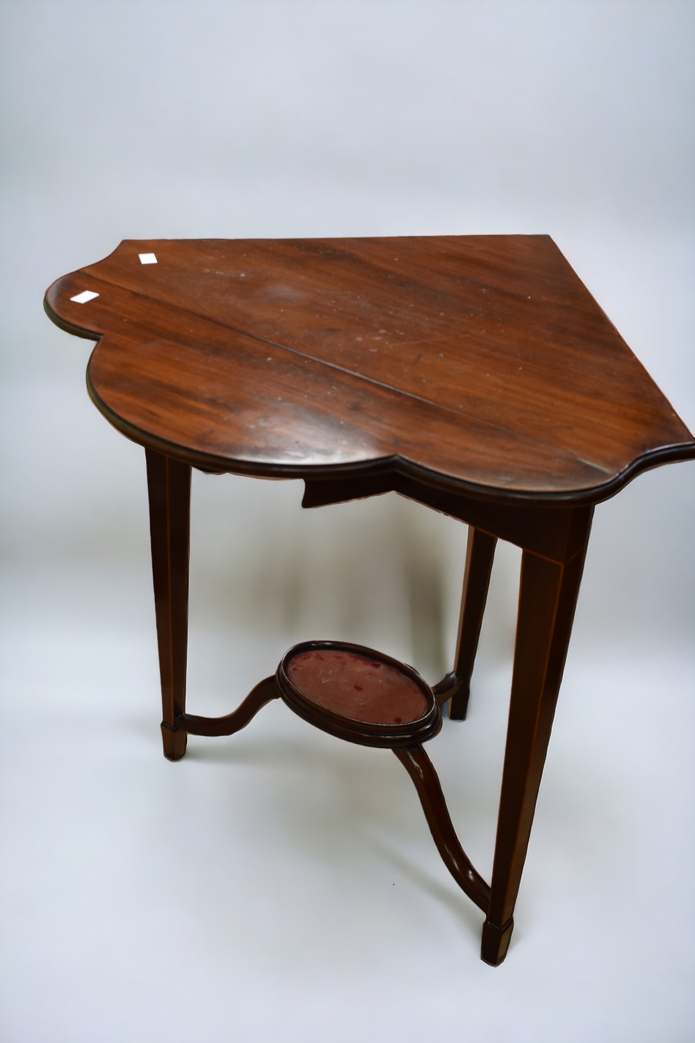 A 19th Century mahogany drop front corner table/stand on inlayed sabre legs. - Image 2 of 2