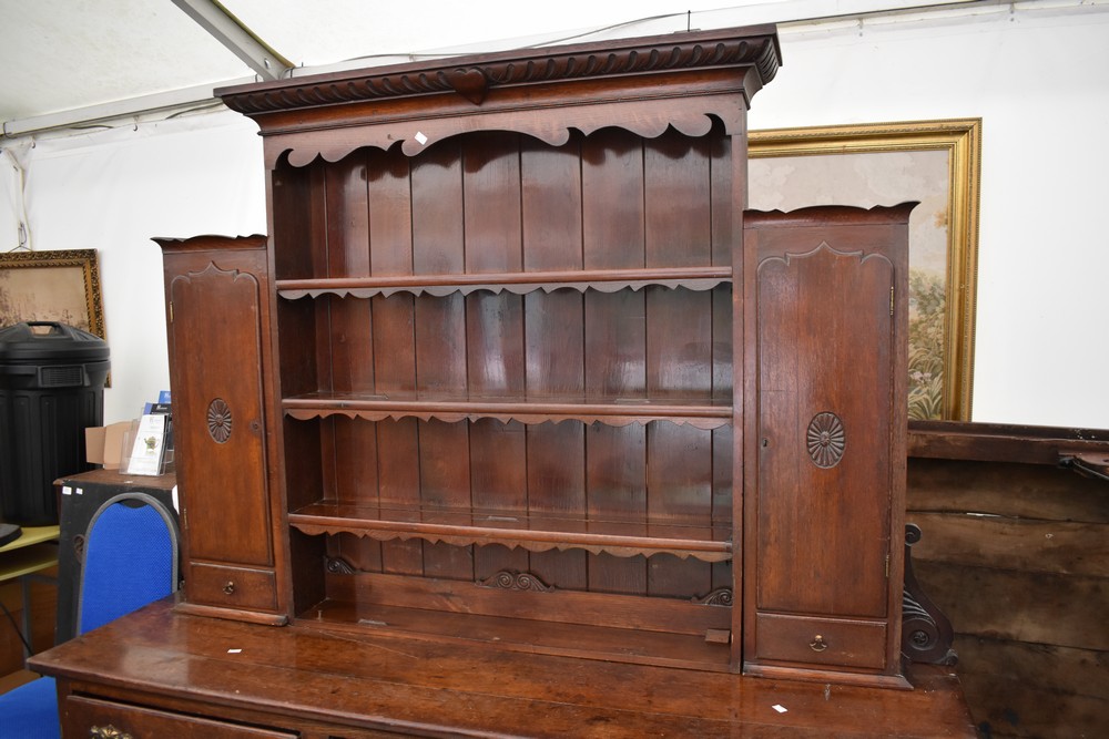 A George III oak dresser with three drawers to base with brass ornaye handles, cabriole legs with - Image 3 of 5