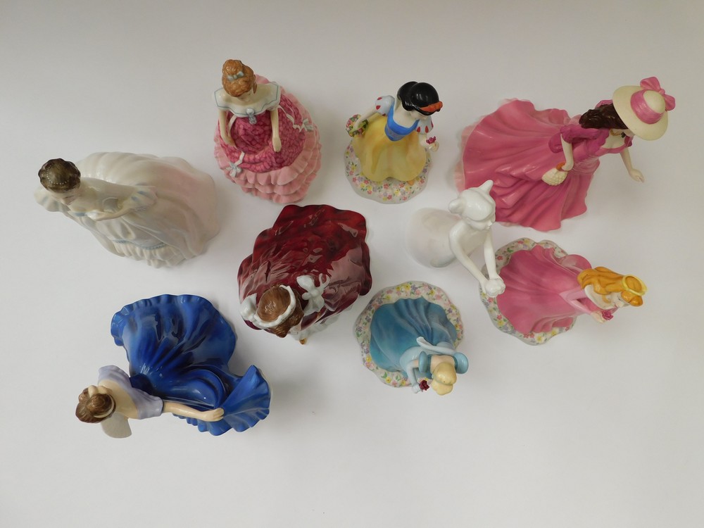 A collection of 9 figurines , to include 3 Royal Doulton Disney series figures, Sleeping Beauty, - Image 2 of 6