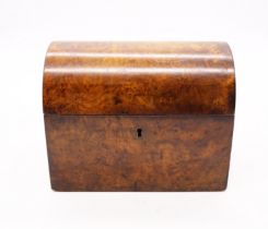 A late Georgian burr walnut tea caddy with two internal compartments.