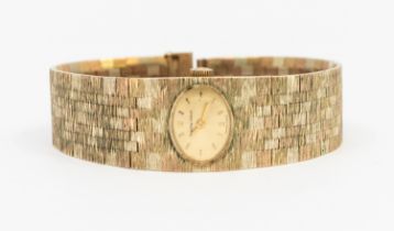 Bueche-Girod- a ladies 9ct gold tri colour wristwatch, comprising a signed oval gilt dial with