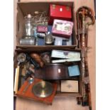 A collectors lot containing mantle clock, walking sticks, ships in bottles, coins, costume