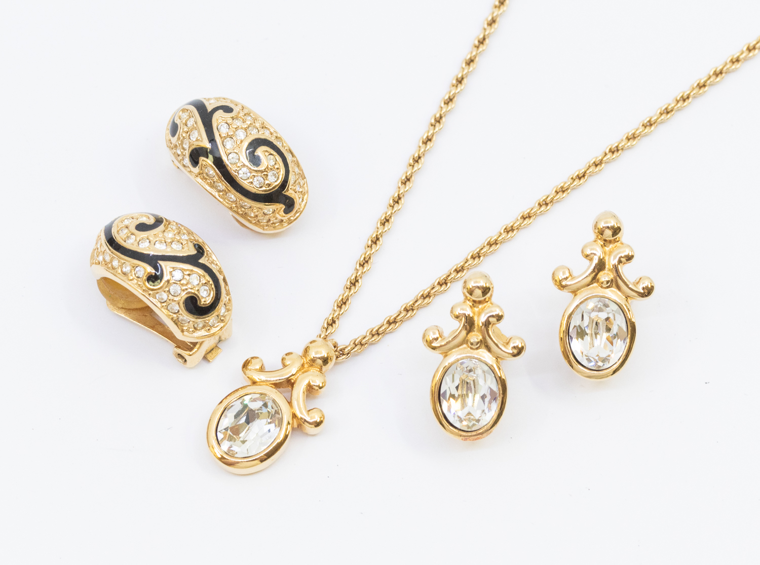 Christian Dior - a gold plated crystal set pendant with scrolled bale, length approx 22mm, suspended