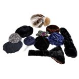 A collection of hats to include: a Lapin hat in greys and fawn with a large ginger fur bobble and