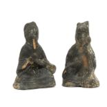 Two Chinese funeral terracotta figures, probably late Ming, modelled as seated Deities, approx