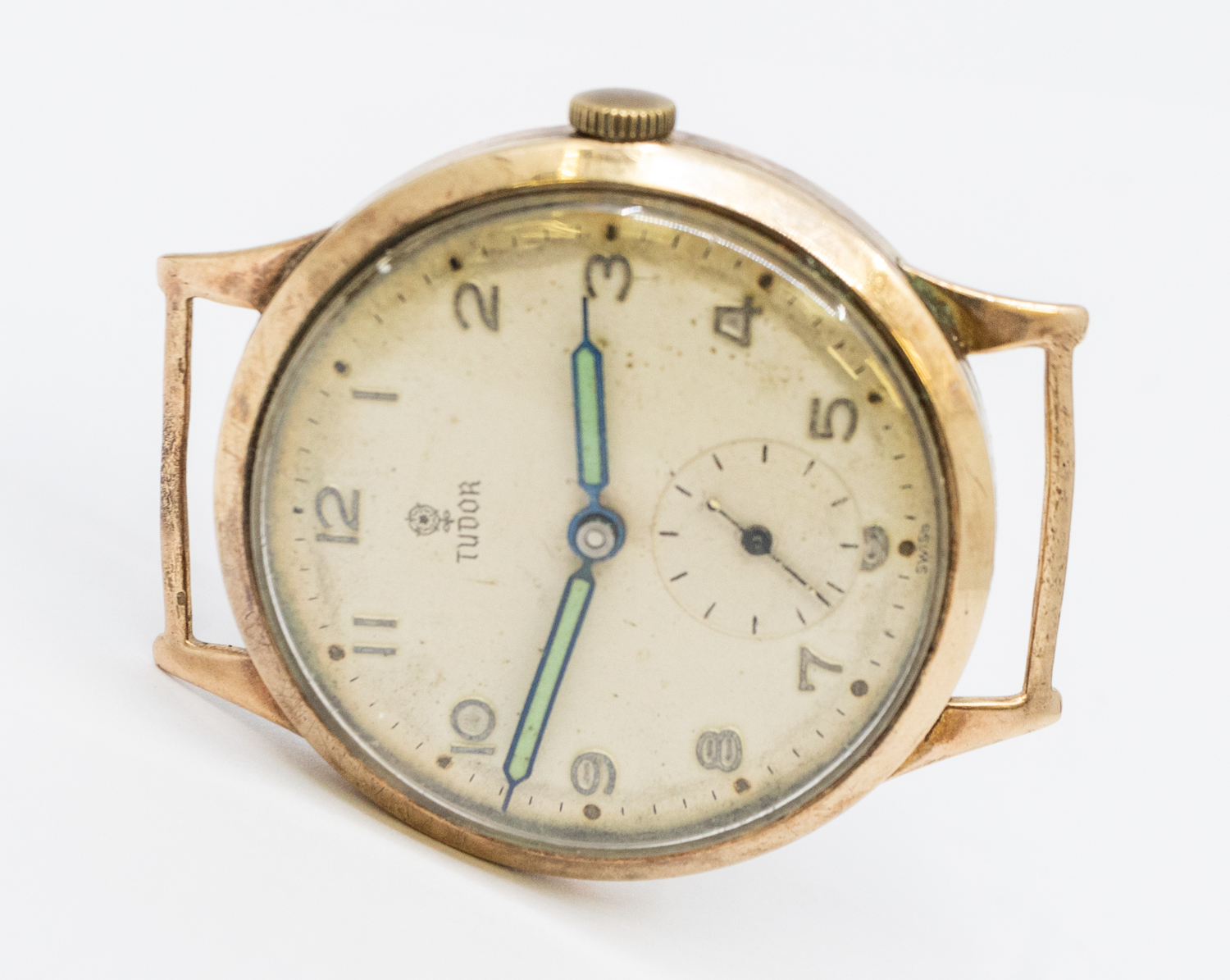 Tudor- a gents vintage 9ct gold cased Tudor watch face, comprising a round signed silvered dial with