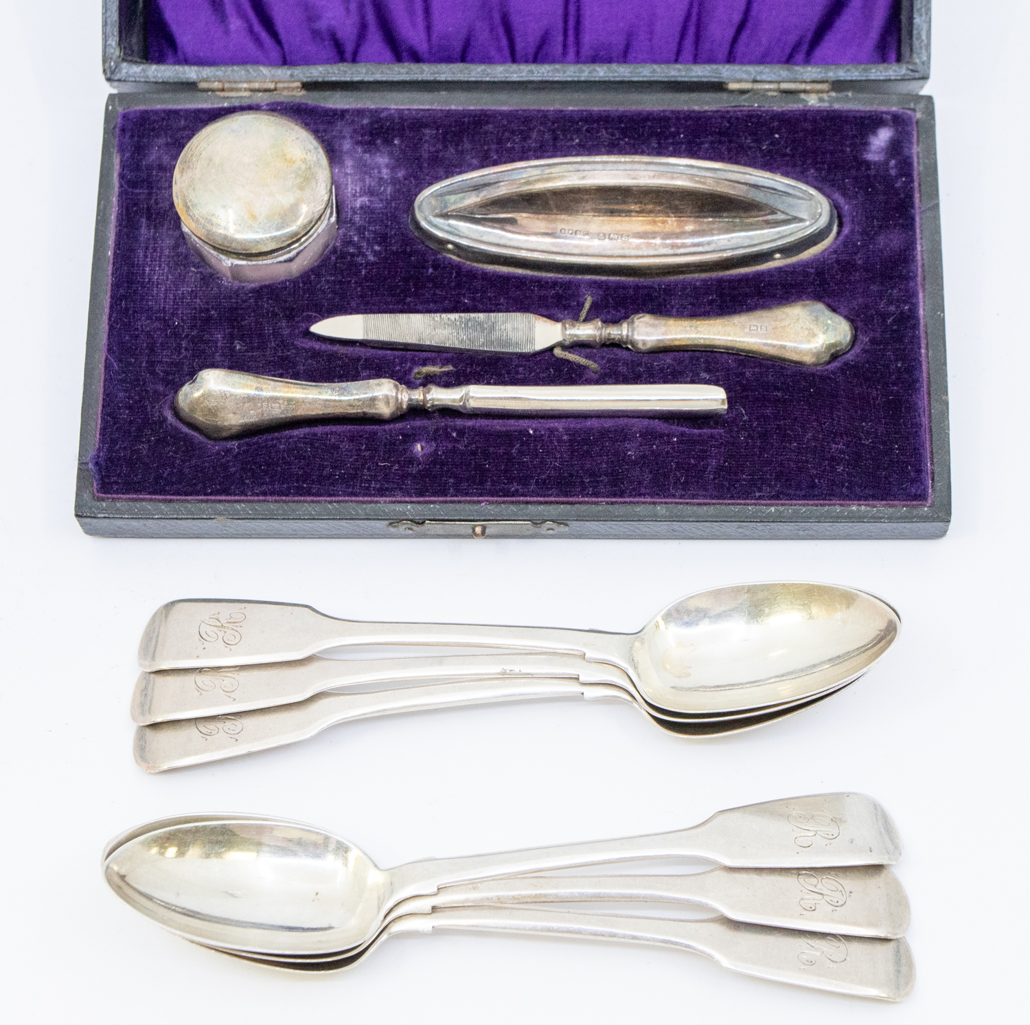 A set of six Victorian silver fiddle patterned tea spoons, all initialled "R" to terminals,