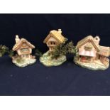 Three Pendelfin large sculptural models to include; Castle Tavern, Cobble Cottage and Fruit Shop (