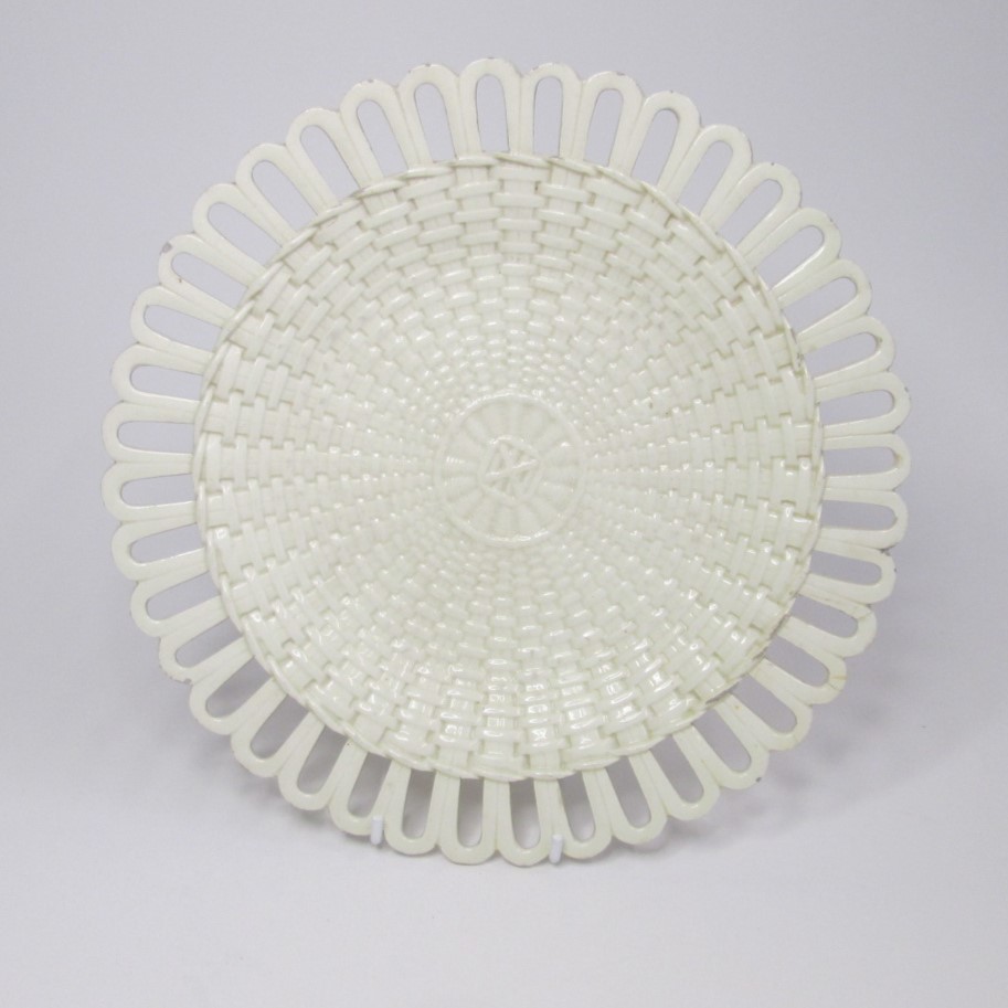 A marked Wedgwood creamware pierced rim, basket weave plate with the date letter P for 1861