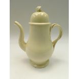 An 18th Century Creamware large pear shaped coffee pot and domed cover, plain body with intwined