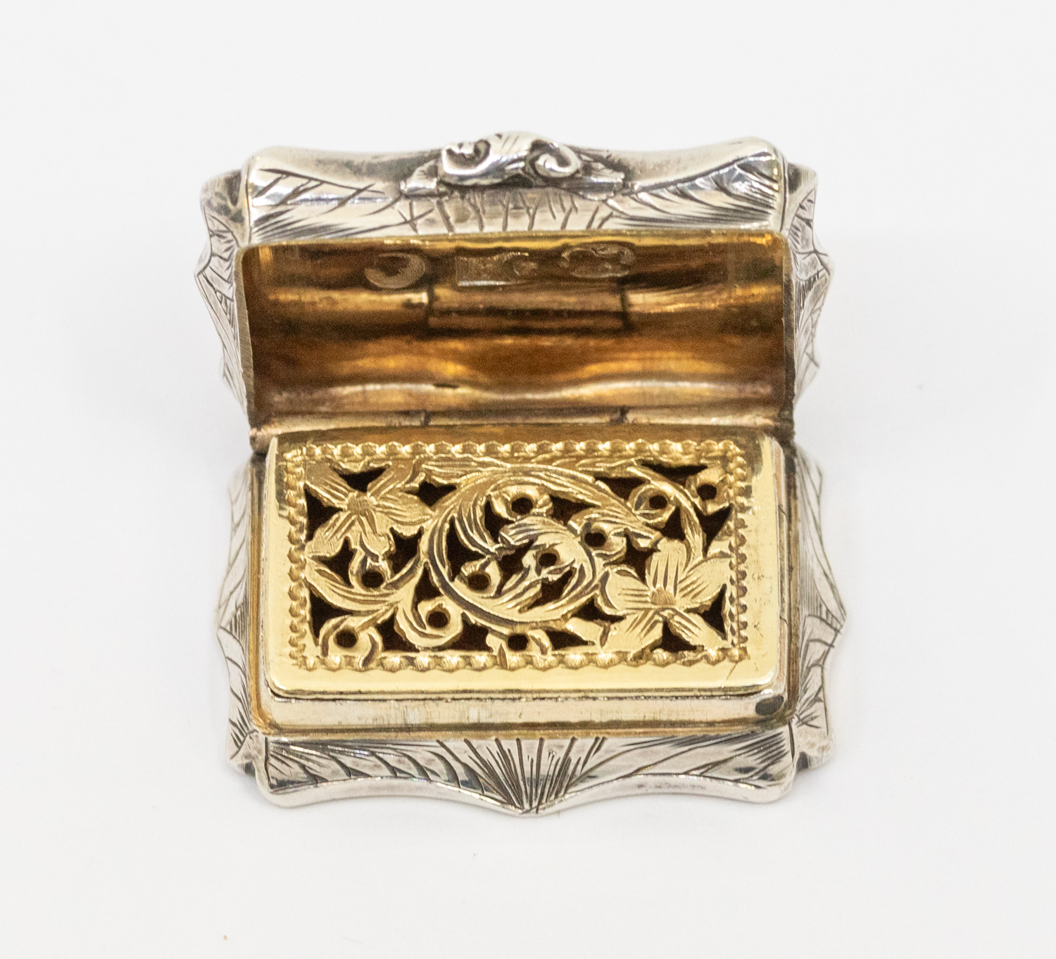 An early Victorian silver shaped rectangular vinaigrette, wavy border, the entire engraved with - Image 2 of 3