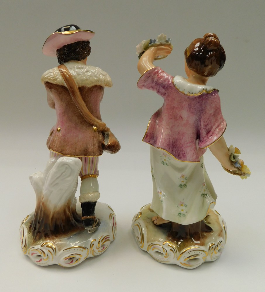 Two Royal Crown Derby porcelain figures "winter and spring" painted by S Whitehead, damage to leaf - Image 3 of 4