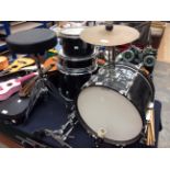 Remo childs drum set with seat and stands, black gloss finish.