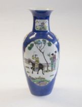 A Chinese powder blue ground porcelain vase, Qing Dynasty, late 19th century, ovoid body and trumpet