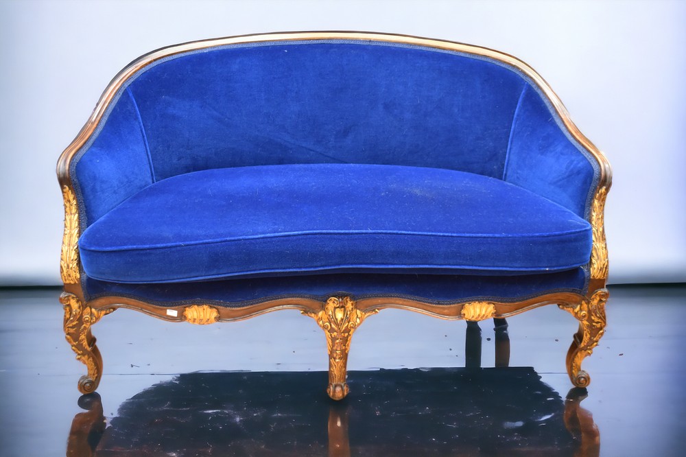 A mid 20th Century Louis XV sofa suite in mahogany and dark blue velvet covering with gilt detail,