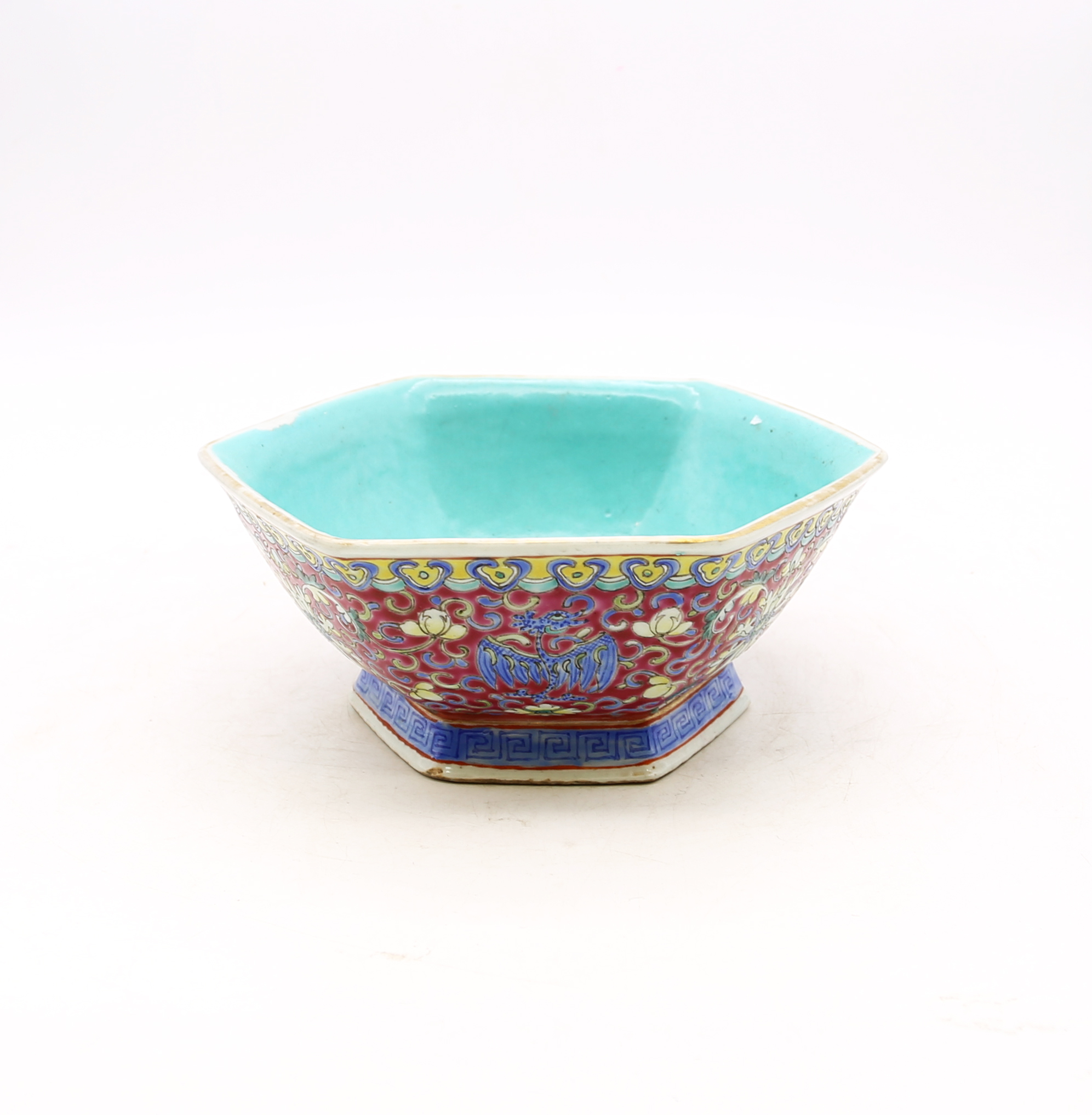 A Chinese polychrome porcelain bowl, late 19th century, comprising a hexagonal form, decorated