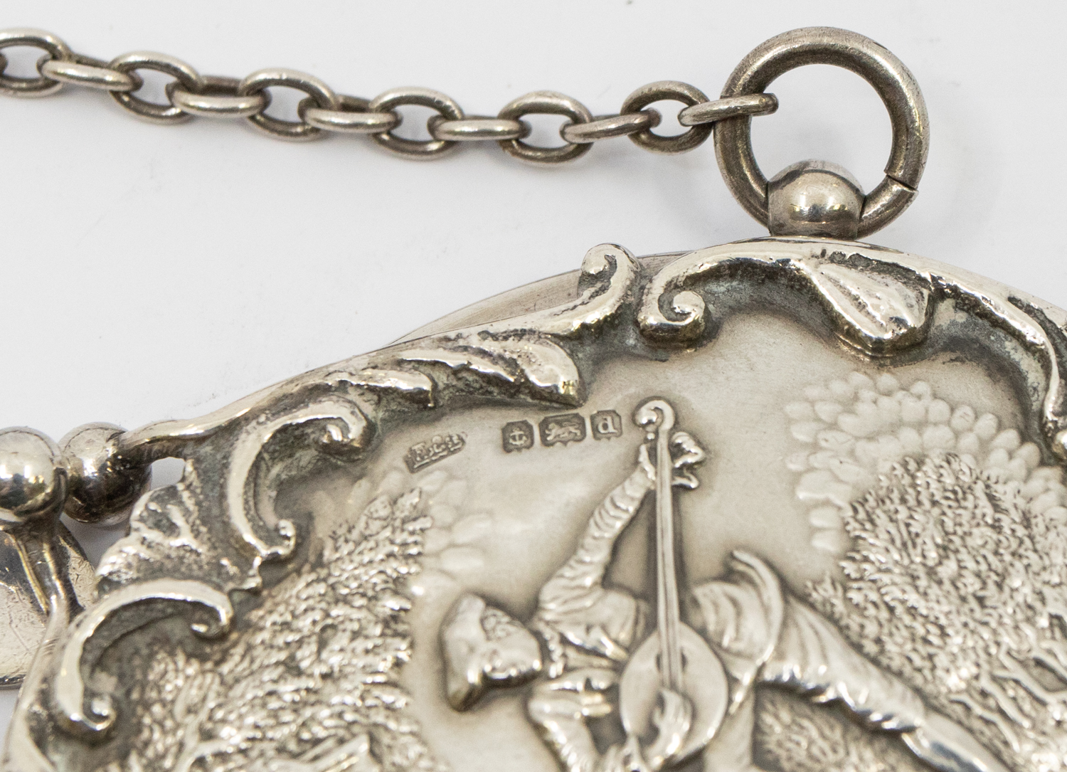 An Edwardian silver chatelaine purse, with ornate Continental style figural and foliage repousse - Image 2 of 2