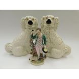 A pair of 19th Century Staffordshire dogs along with a Staffordshire figure of a Sheppard , 1 dog