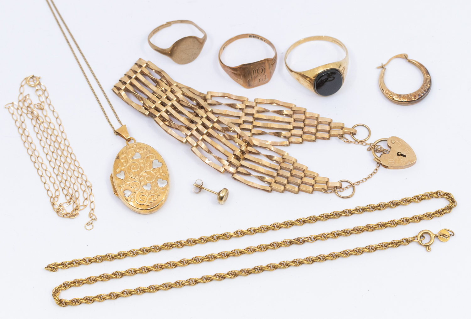 A collection of weighable 9ct gold including a locket, chains, gate bracelet, 2 signet rings