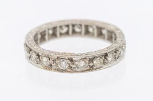 A diamond set white metal eternity ring, width approx total diamond weight approx 0.90ct, size S,