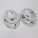 A pair of Volkstedt oval trencher salts painted with deutsche blumen Circa 1900 Size; height 4cm