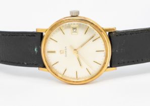 Omega- a gentleman's vintage gold plated Omega wristwatch, comprising a signed silvered dial with
