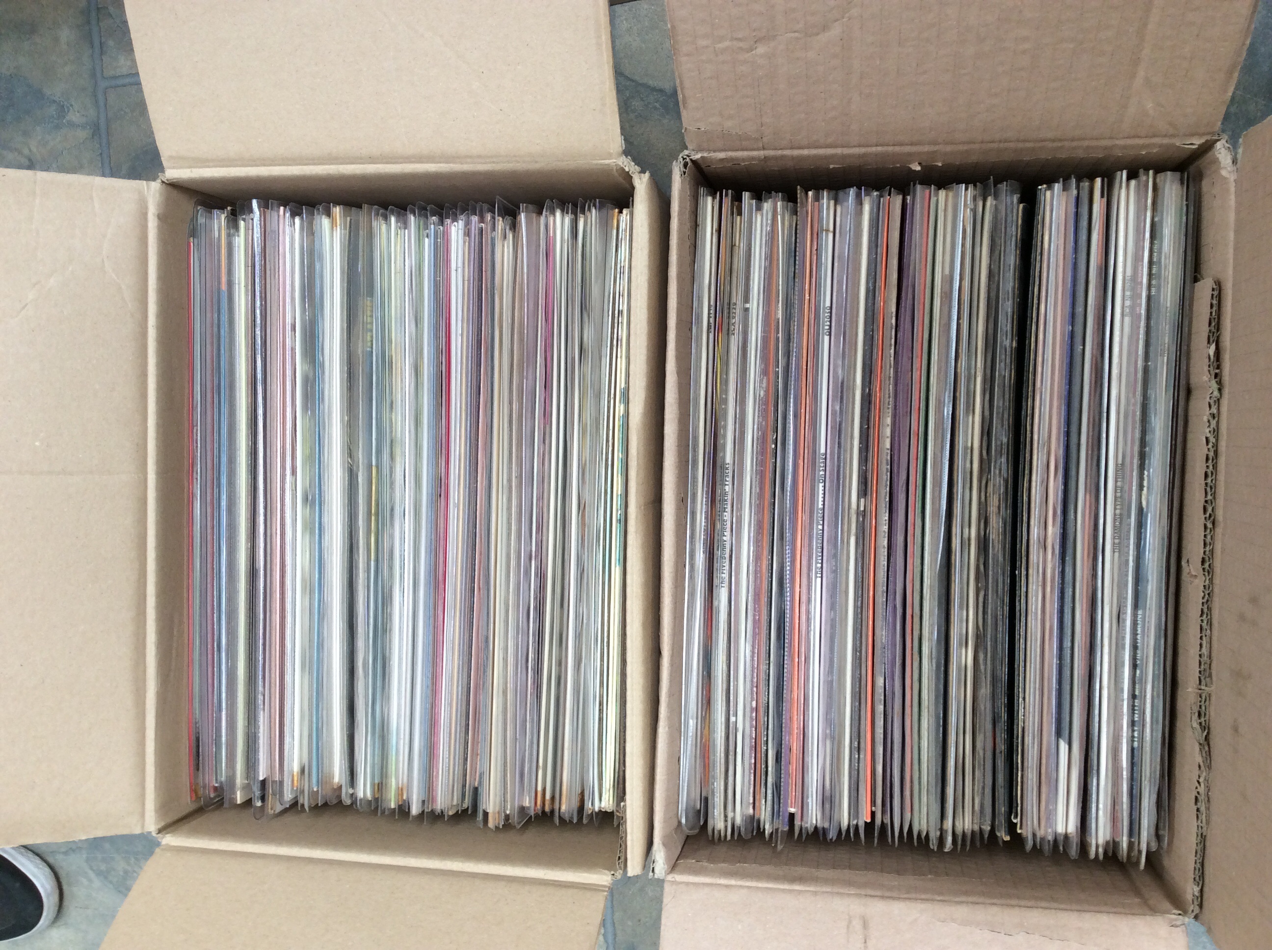 Two boxes of mixed LPs.