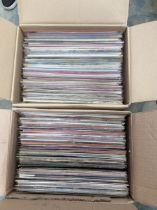 Two boxes of mixed LPs.