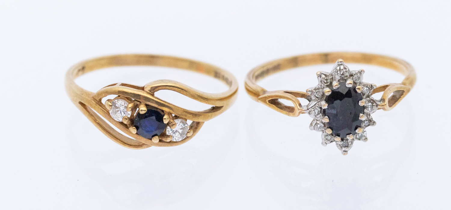 A cz and sapphire 9ct gold three stone ring, size N, along with a diamond and sapphire 9ct gold