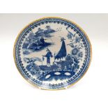 A Salopian  Blue and White Saucer dish printed with the fisherman pattern Circa 1785.    Blue S mark