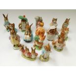 Beatrix Potter - a collection of 14 Beswick (brown backstamp) figurines to include ''Timmy Willie'',