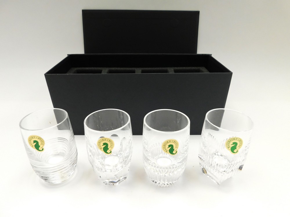 A boxed unused Mixology set of 4 Waterford Crystal glasses.