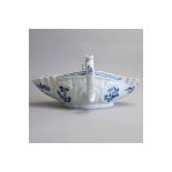 A Worcester blue and white small sized twin handled sauce boat, painted with a Chinese lake scene.