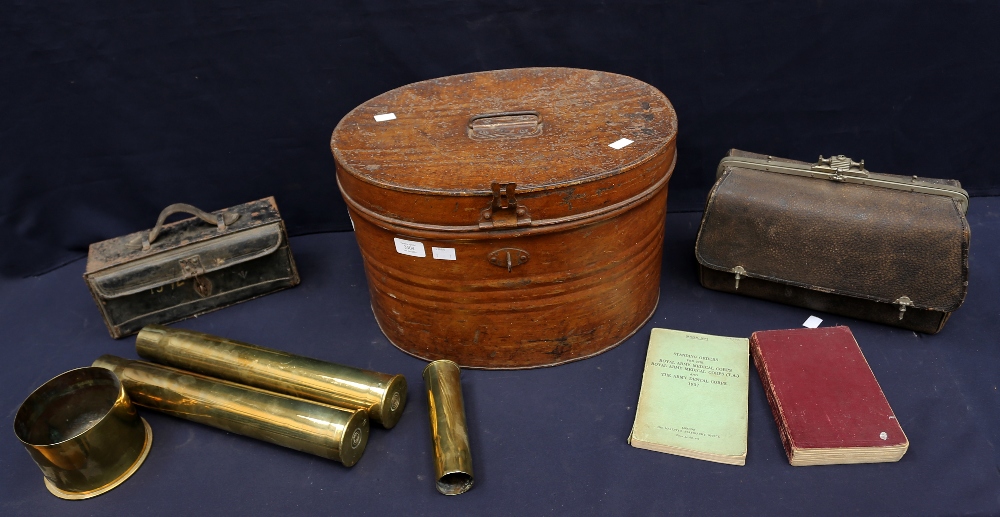 Militaria Interest: A mixed lot to include a pair of long cylindrical shell case stands, a single