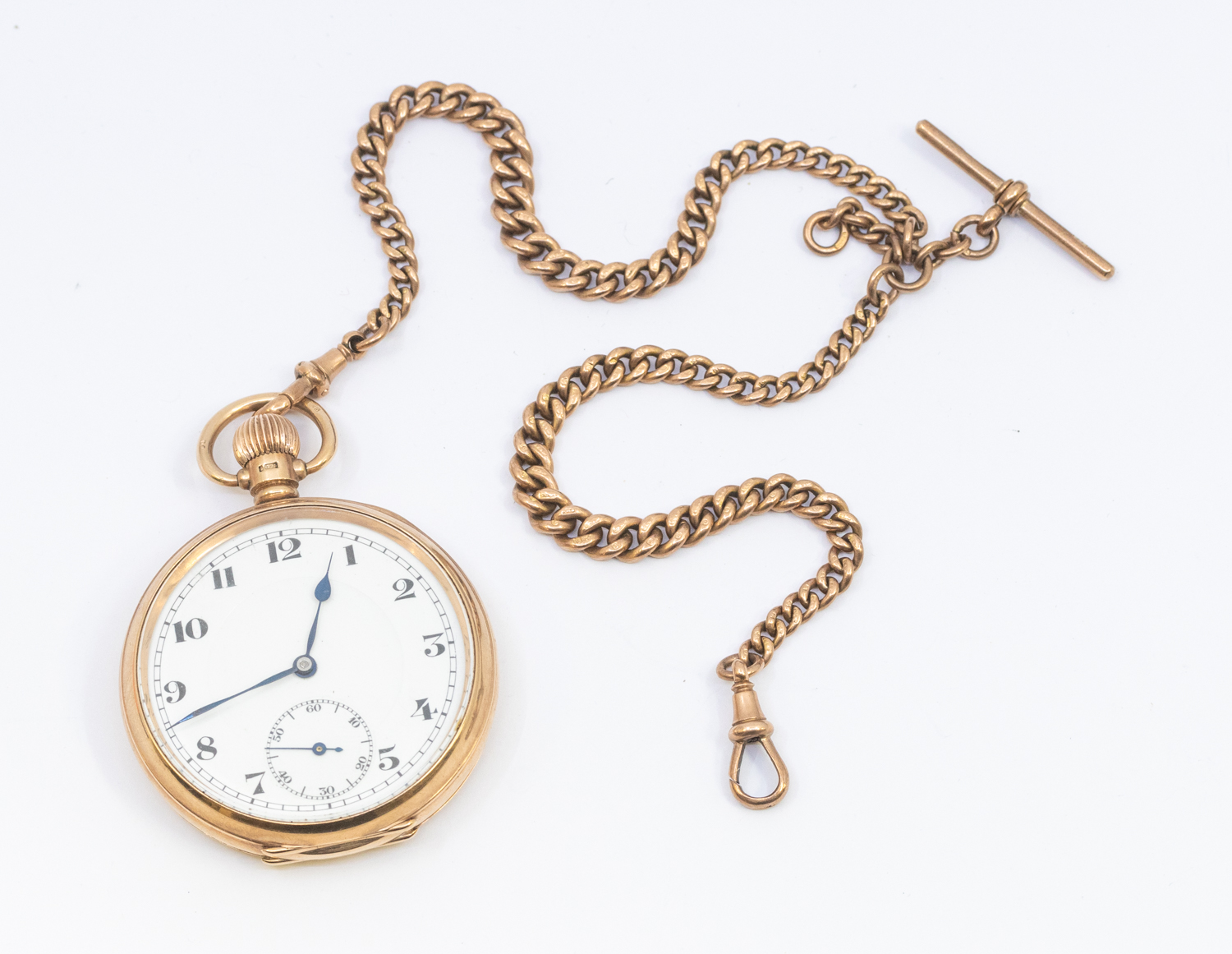 A 9ct gold open faced pocket watch, comprising a white enamel dial with Arabic markers, subsidiary