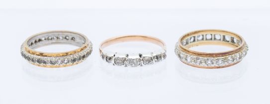 A diamond and 9ct gold five stone ring with platinum setting, set with graduated old cut diamonds (